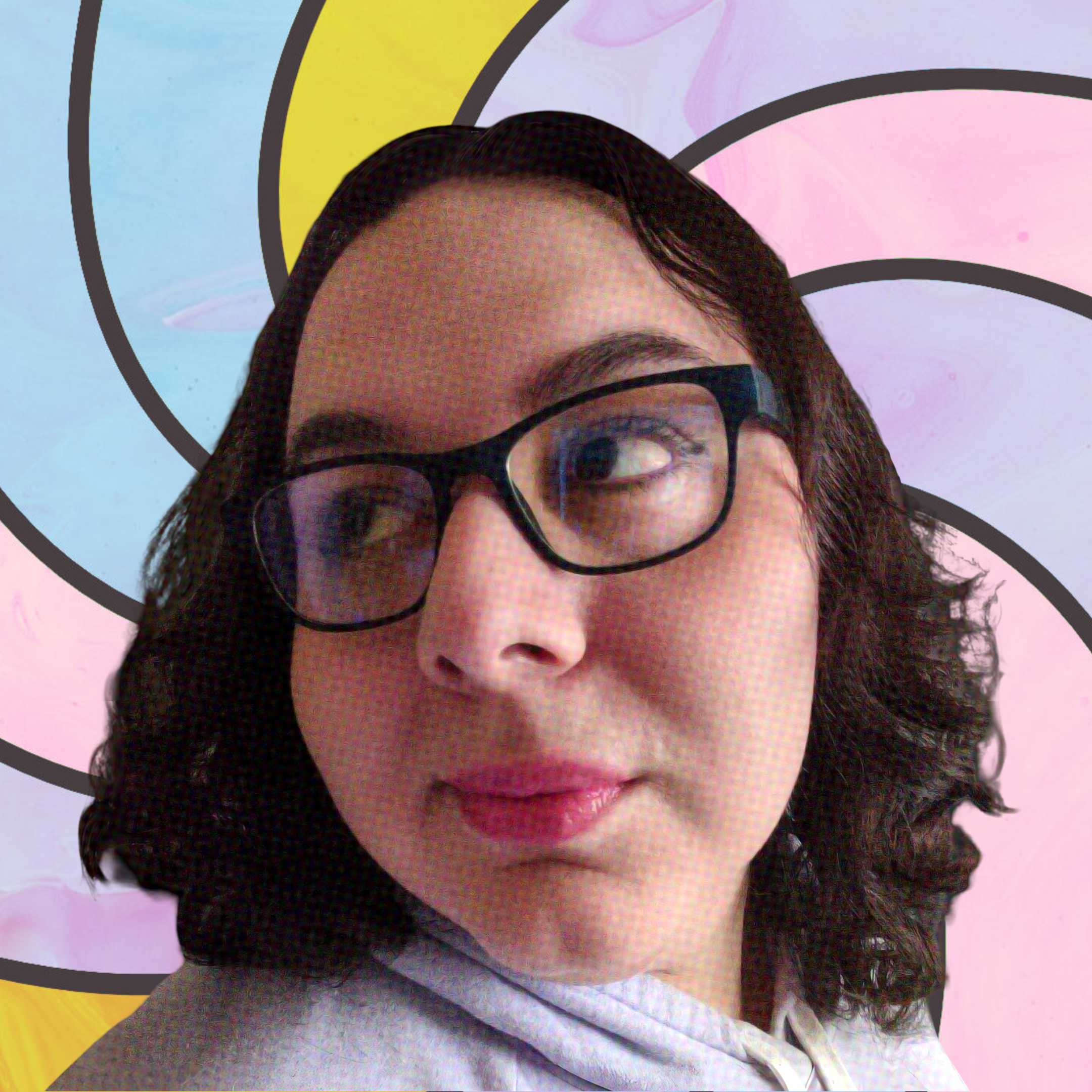 A profile picture of the author of this blog, Bea Hrnja. A colorful spiral is in place for the background of the photo.